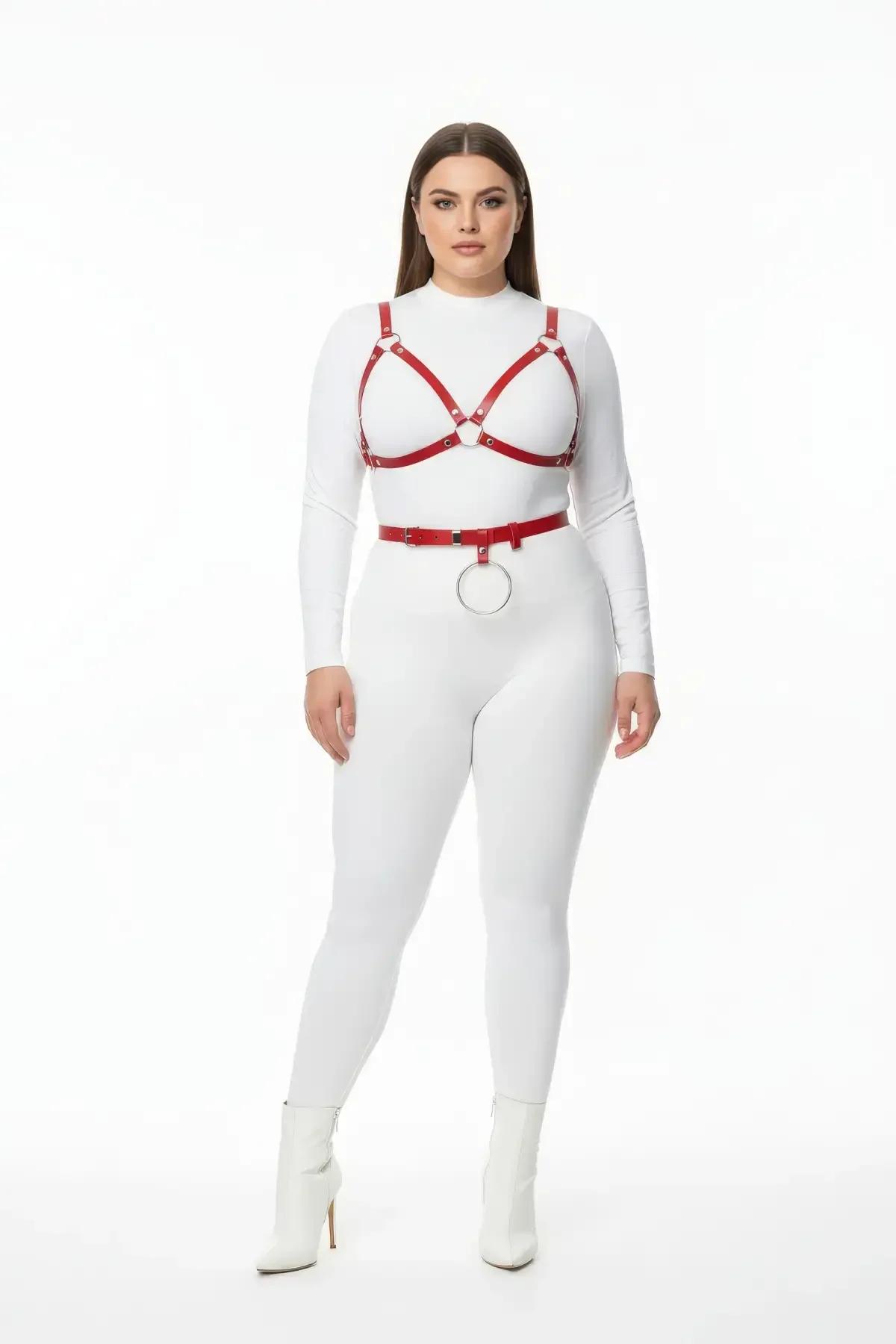 red vegan leather chest harness and waist belt set with silver O-ring on plus-size model over white bodysuit