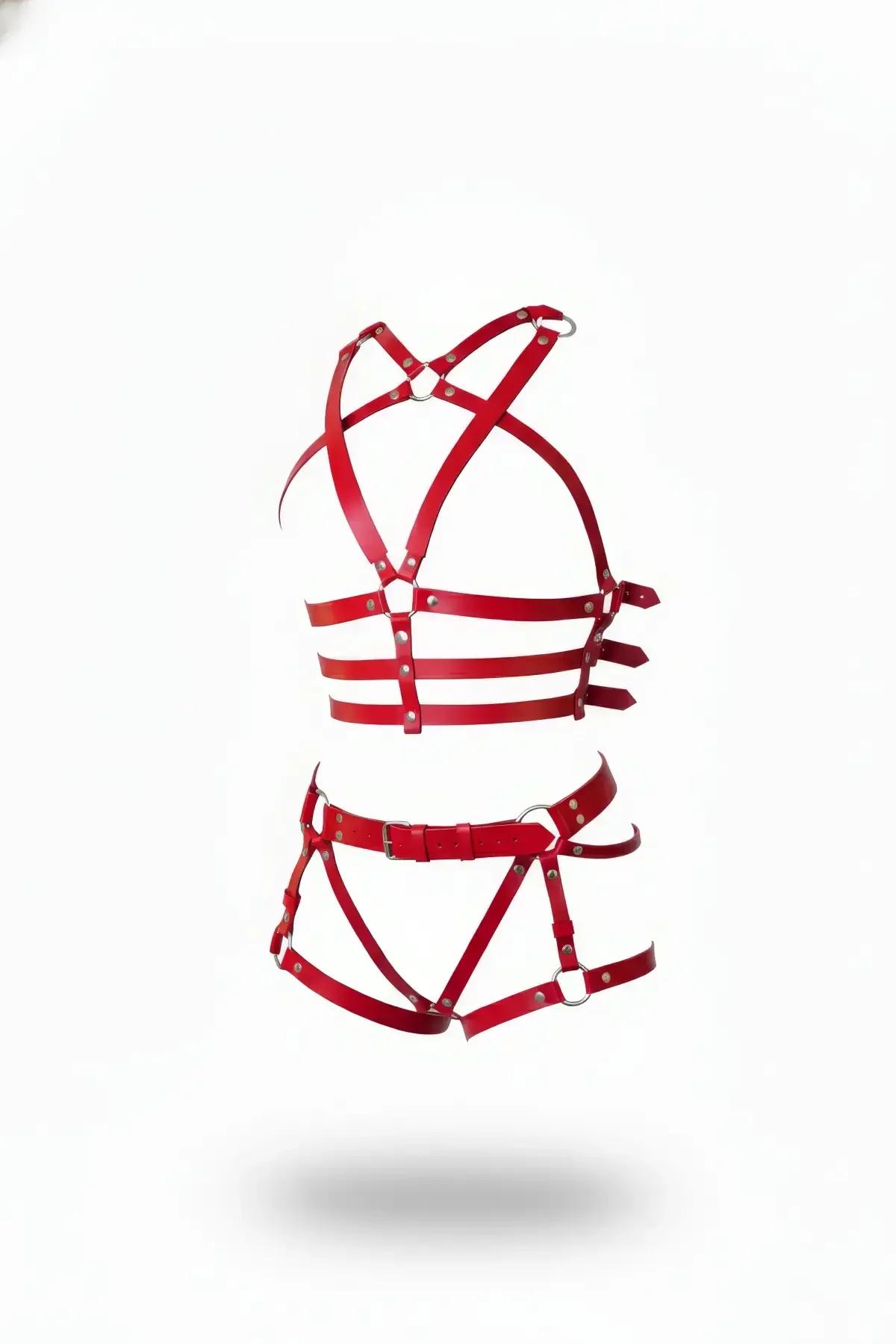 Red faux leather cage harness set with silver O-rings, showing chest harness and waist-thigh piece on white background