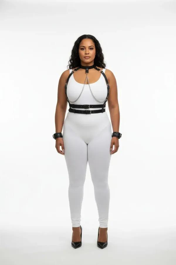 black vegan leather choker body harness with silver chain accents double buckle waistband and matching wrist cuffs worn over