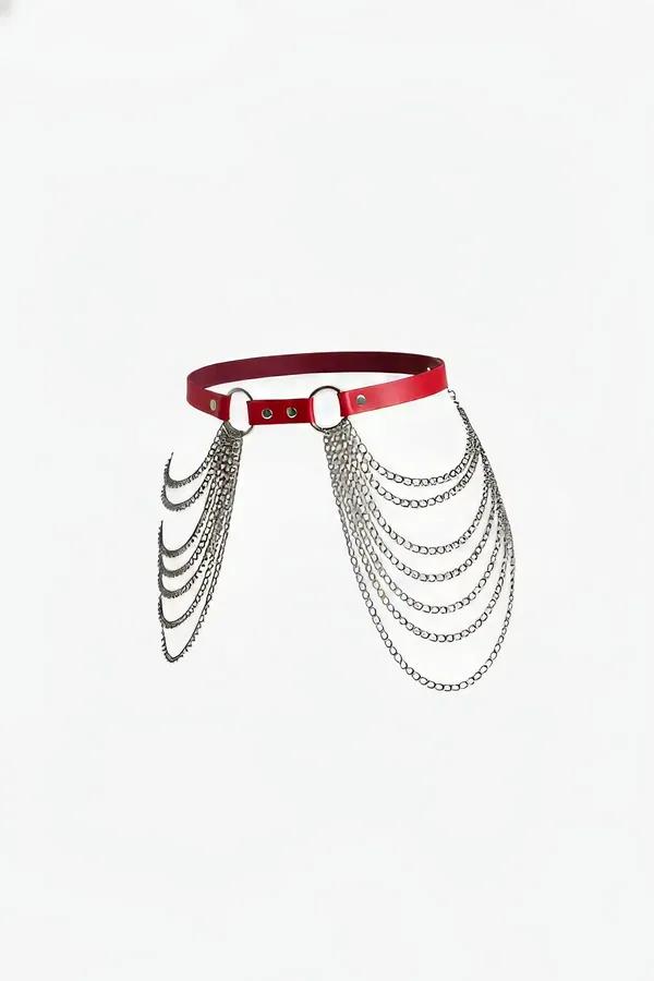 Red faux leather waist harness with five cascading silver chain layers from a central O-ring, front view
