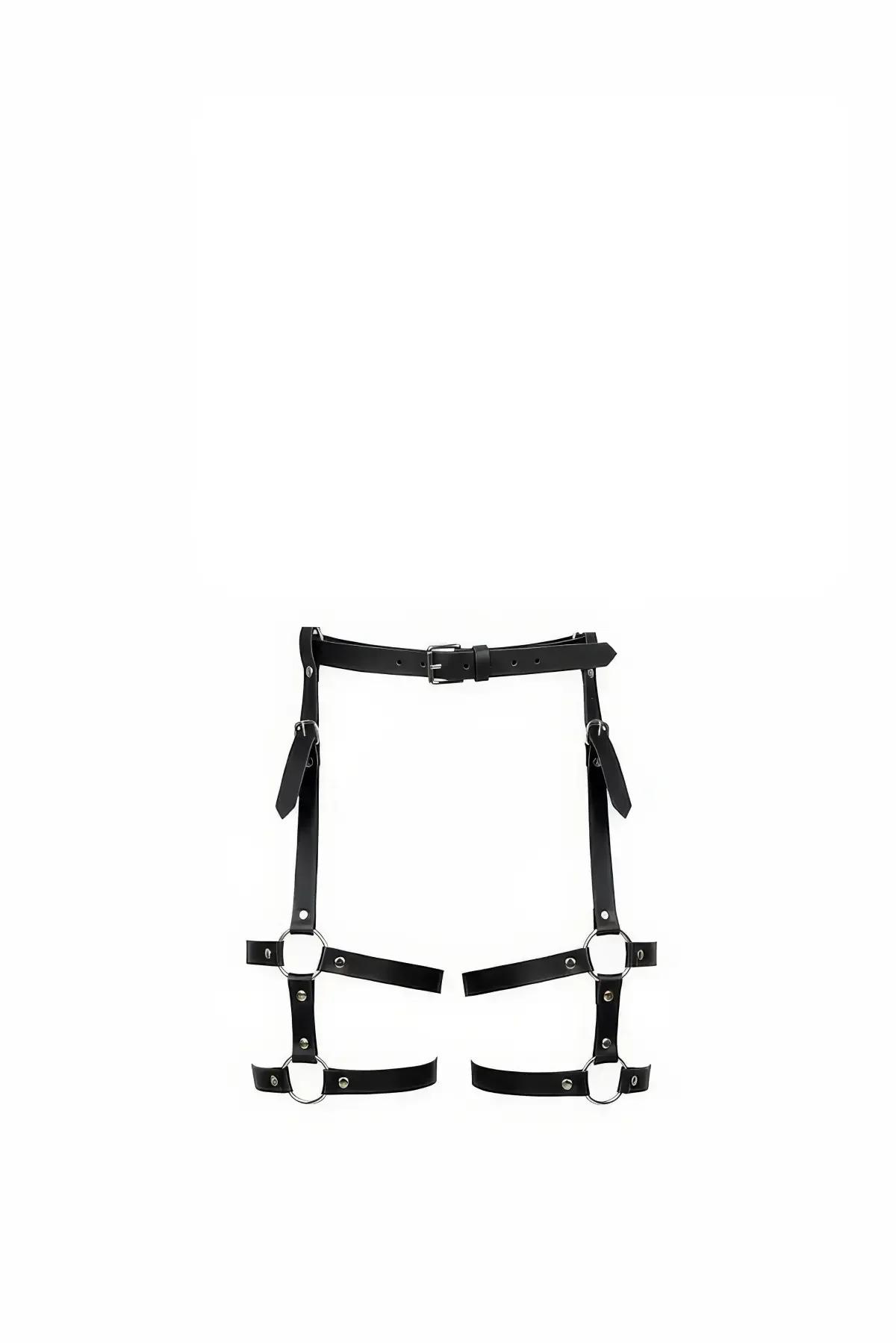 black faux leather thigh harness with silver O-rings and buckle waistband, front view flat lay