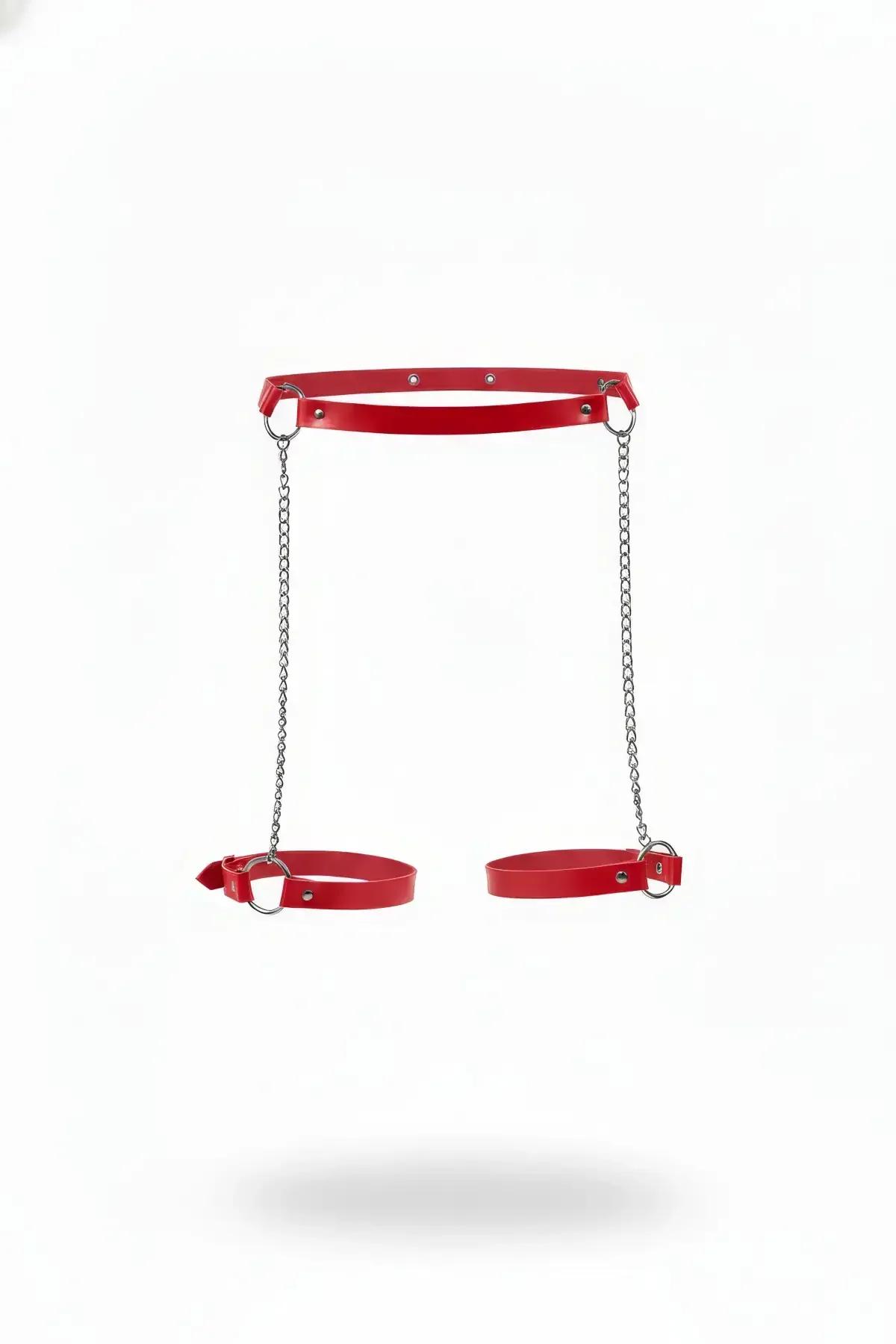 Red faux leather leg harness with dual silver garter chains and adjustable O-ring calf cuffs on white background