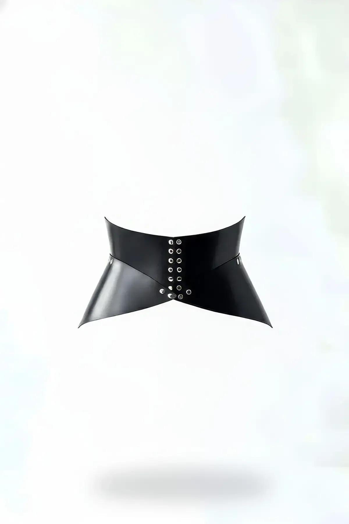 black faux leather sculpted waspie corset belt with silver eyelet column front closure and pointed hourglass silhouette