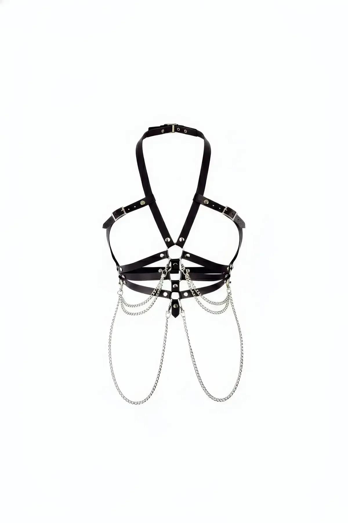 black faux leather halter body harness with three draped silver curb chains and stud rivets on white background