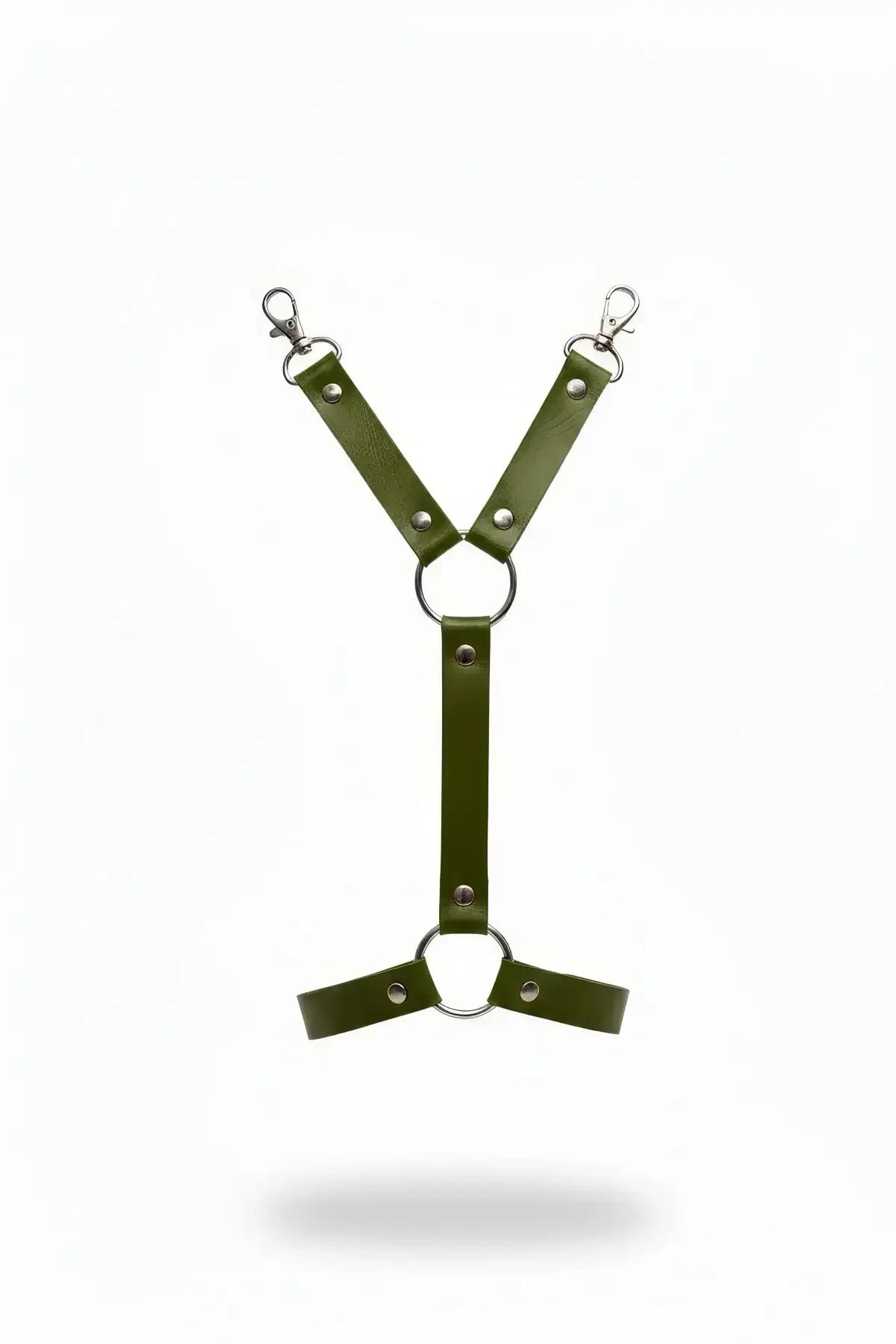 Olive faux leather garter harness with dual silver O-rings, rivet hardware and swivel snap clips, front view on white backgro