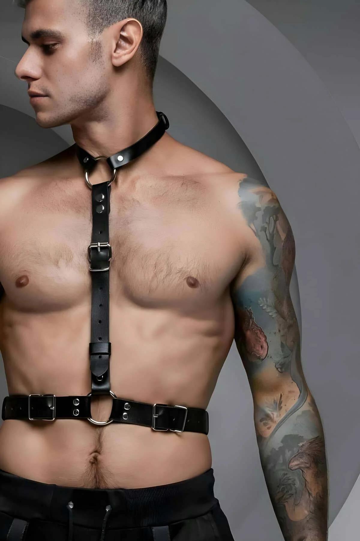 black vegan leather mens body harness with silver O-rings collar band and adjustable waist buckles front view