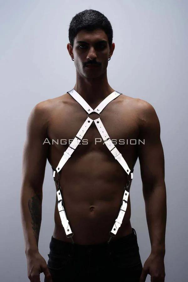 white reflective X-cross chest harness with silver O-ring center detail worn by male model
