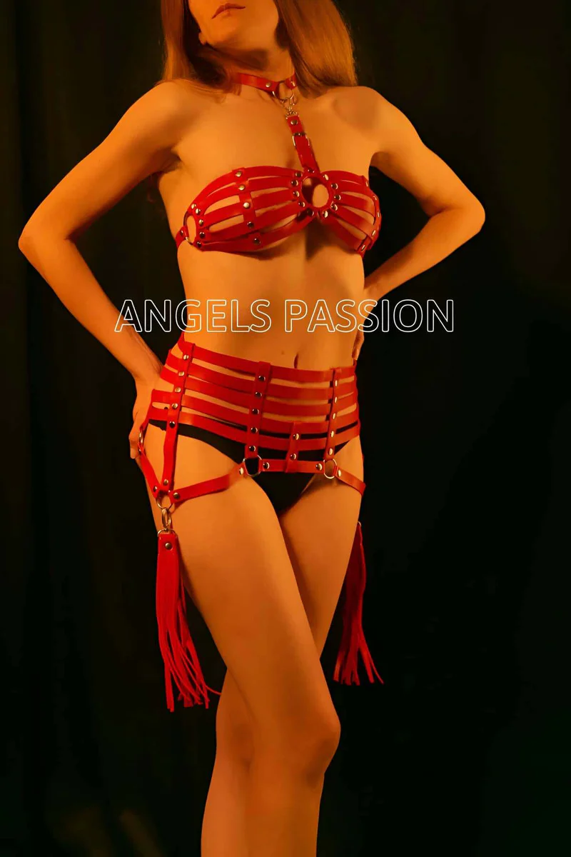 Red halter neck harness top with O-ring detail and tassel garters