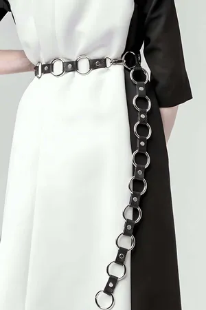 Black faux leather belt with silver ring chain detail