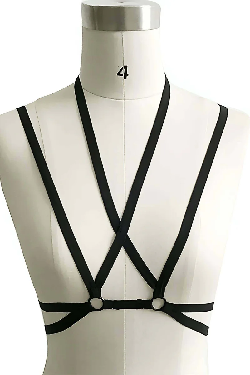 Black strappy harness with O-ring detail close-up