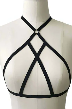 Black strappy O-ring body harness worn on a model