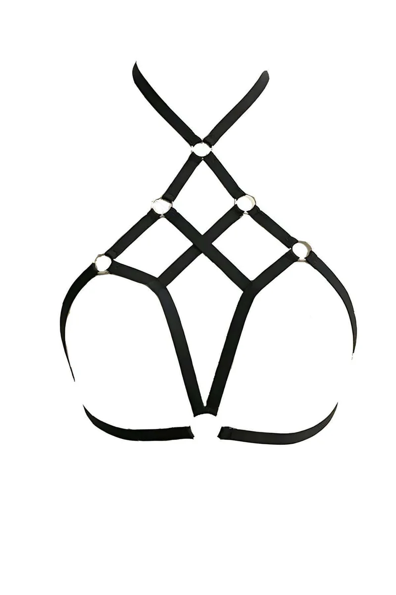 Close-up of black vegan leather chest harness strap detail with O-ring