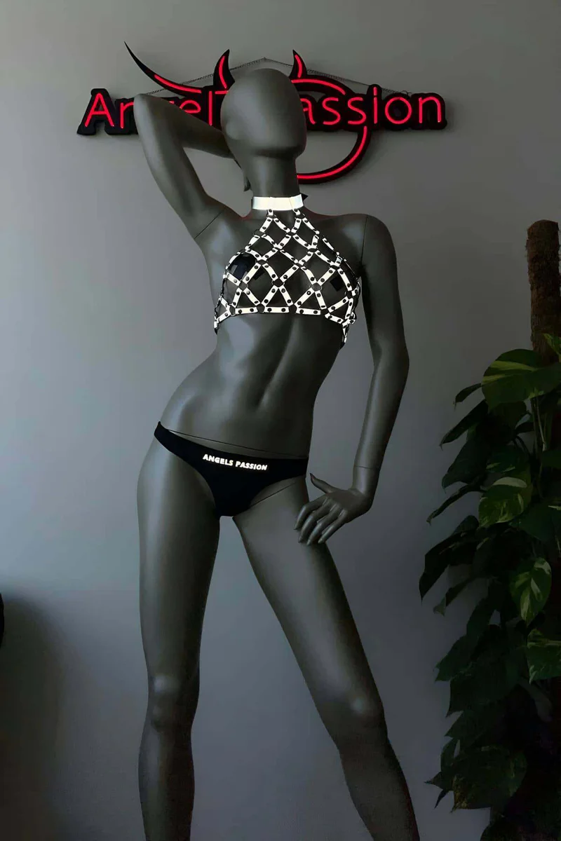 Close-Up Silver Chainmail Hardware Detail Reflective Rings on Festival Lingerie Set with Black Thong and Halter Top