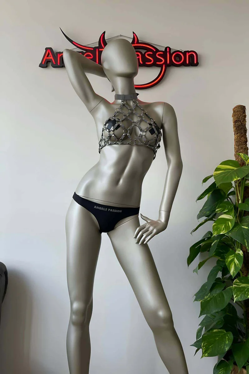 Festival Harness Outfit Silver Flat Lay with Black Shorts on Mannequin Displaying Reflective Chainmail Halter Top