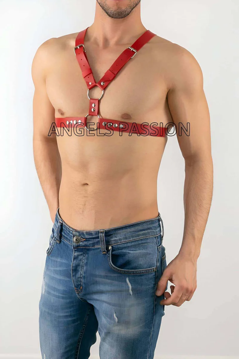 Red faux leather harness close-up silver O-ring hardware on chest