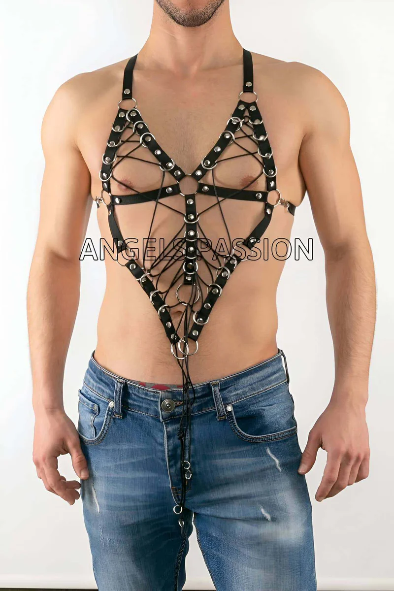 Close-up of black vegan leather laced body harness O-ring detail