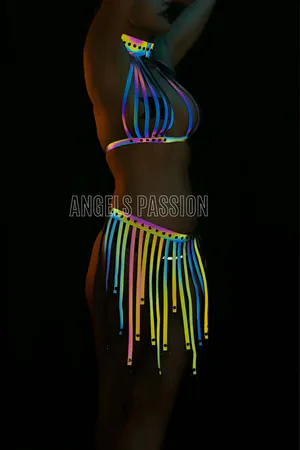 Reflective halter top and tassel skirt set with rainbow colors.