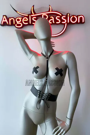 Black vegan leather lace-up corset body harness with adjustable chest strap