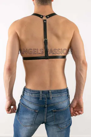 Black faux leather chest harness with adjustable straps and silver buckles