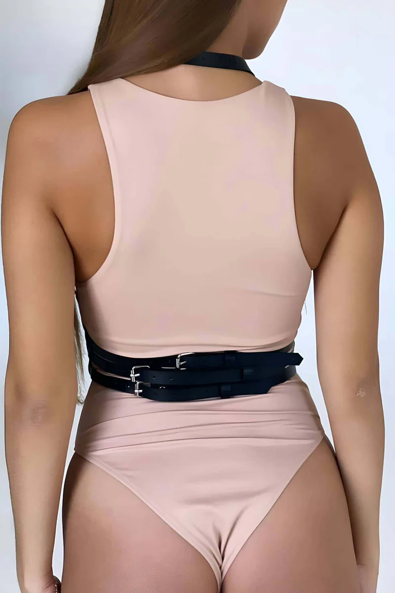 Back view of black faux leather body harness with triple buckle detail