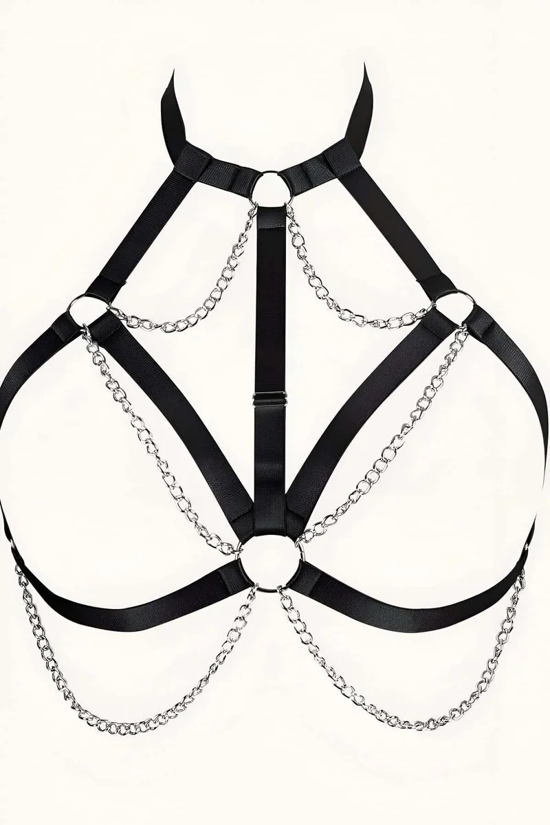 Side profile of adjustable strap system on black harness with chain accents