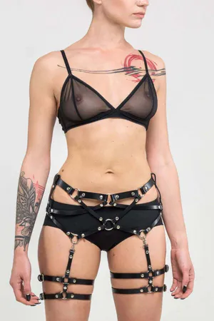 Black Faux Leather Leg Garter Harness with O-Rings and Buckles, worn on a model