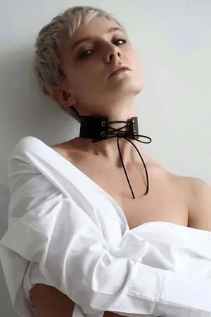 Black Lace-Up Faux Leather Choker Collar with Rope Tie on a person