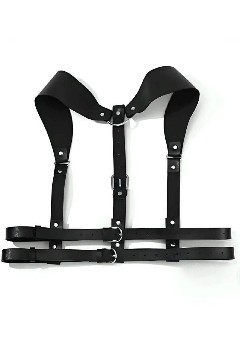 Black faux leather harness showing double buckled straps and adjustable details