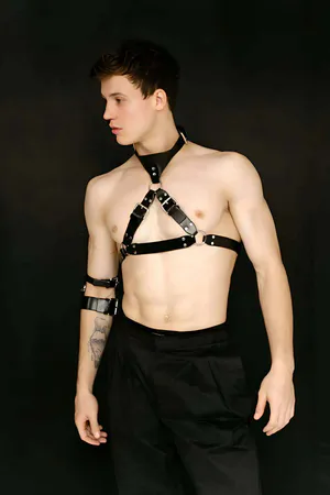 Black Vegan Leather Chest Harness with O-Rings and Arm Cuffs Set on model
