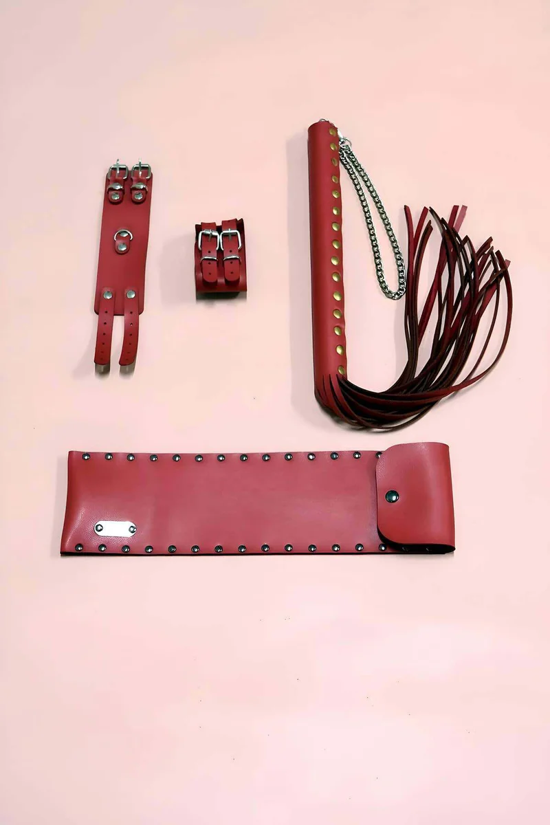 Red Faux Leather Whip and Adjustable Cuff Set with Whip Handle Grip and Reinforced Stitching Close-Up