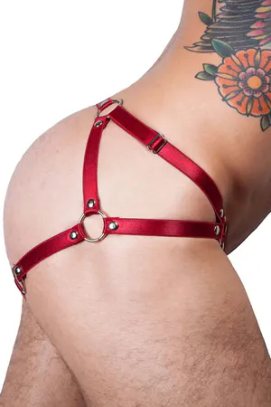 Red vegan leather G-string style body harness with connected hand cuff, silver O-rings