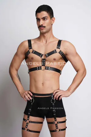 Black faux leather full body harness with O-ring accents and adjustable straps.