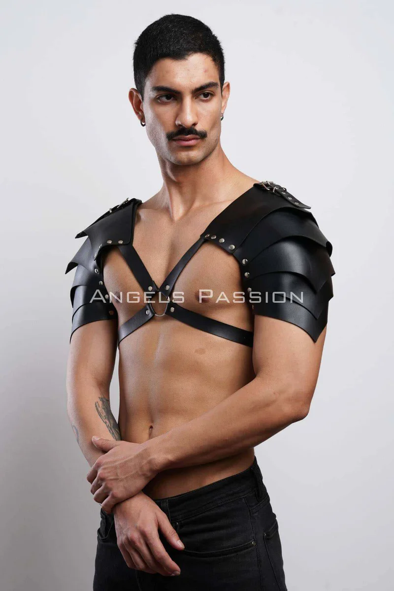 Black leather festival harness with spiked shoulder pauldrons and chest straps
