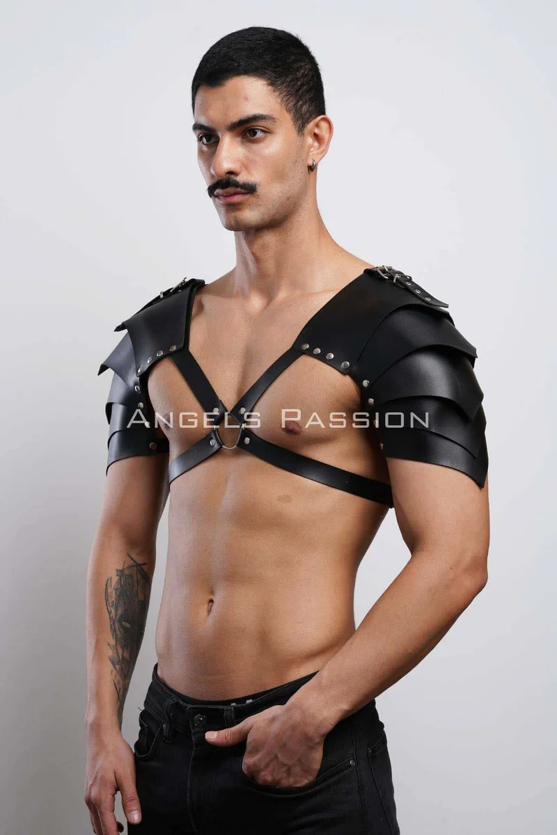 Black faux leather harness chest straps with shoulder armor detailing