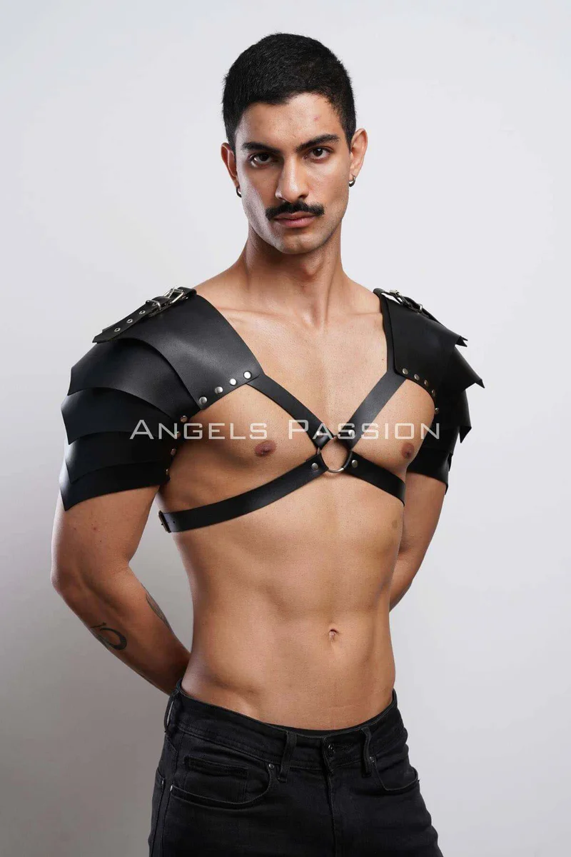 Black faux leather festival harness with shoulder armor details
