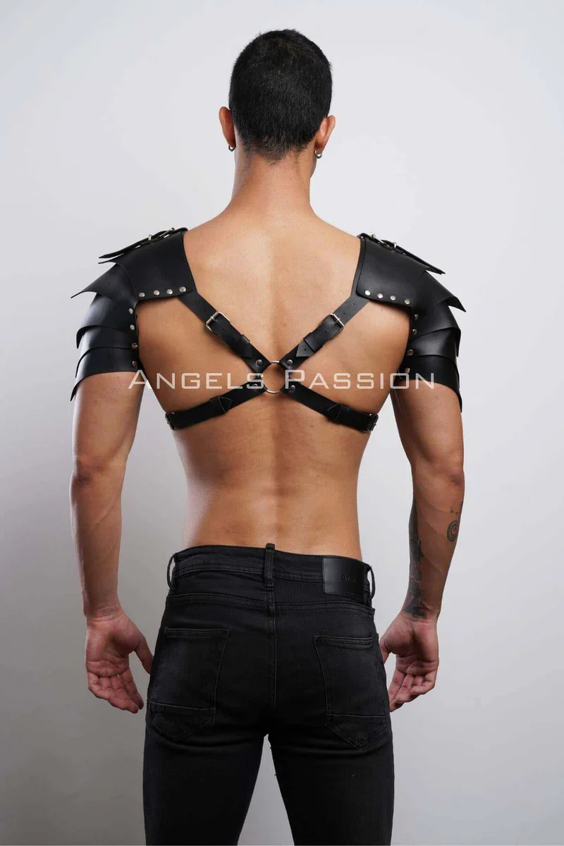 Black faux leather shoulder armor harness with adjustable straps and buckles on back