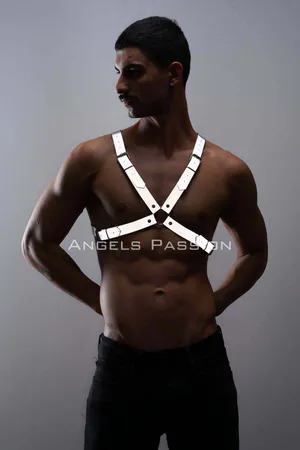 Reflective chest harness with adjustable straps worn by a man