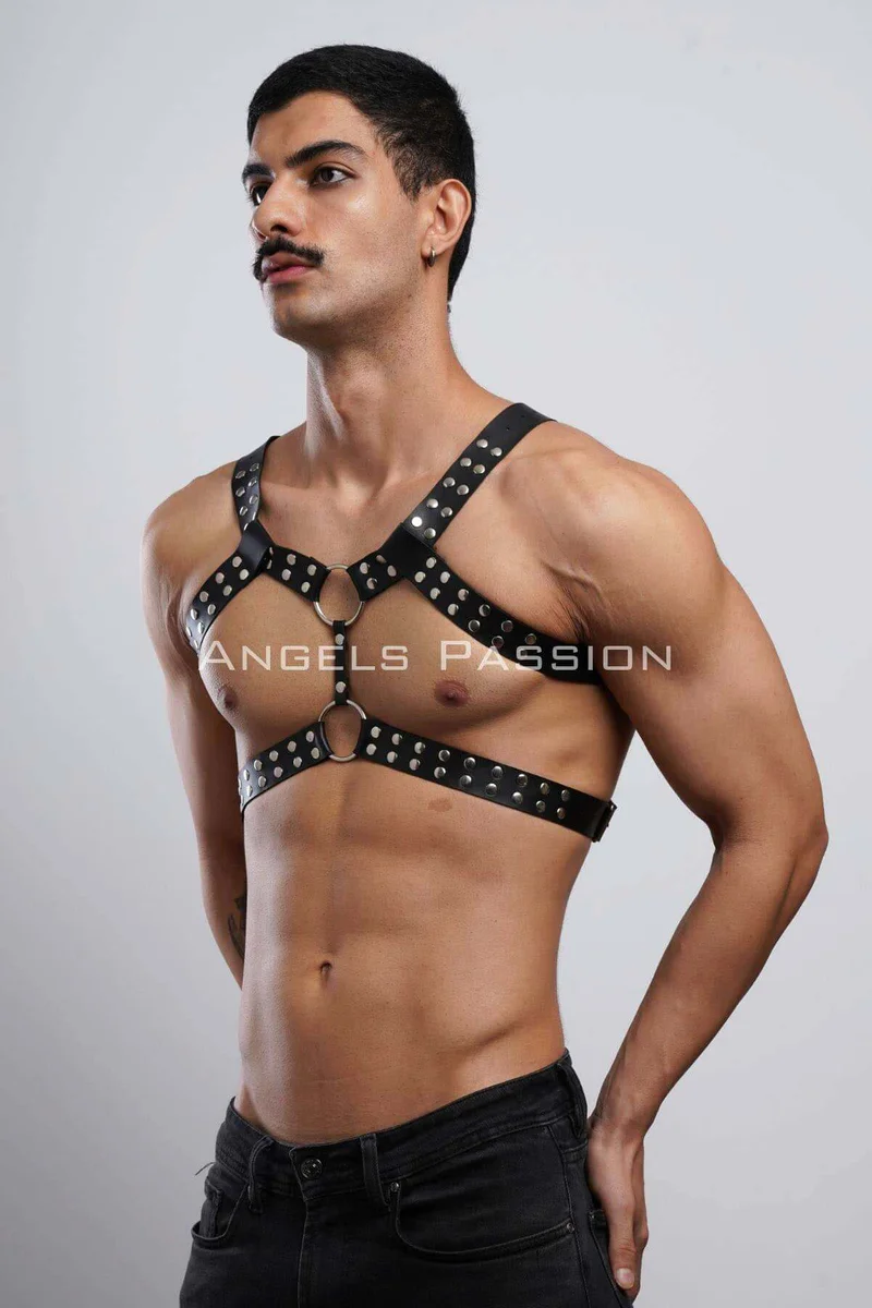 Detail shot of O-ring connectors on the black studded body harness