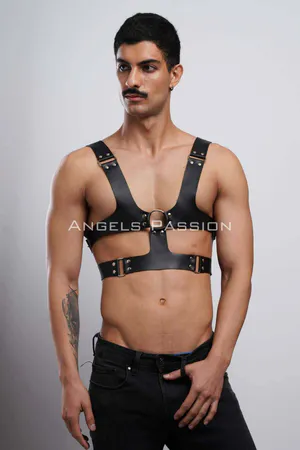 Black faux leather chest harness with O-ring detail and adjustable straps
