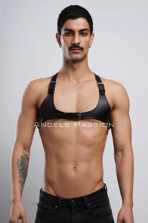 Black faux leather chest harness with adjustable straps and silver buckle closure