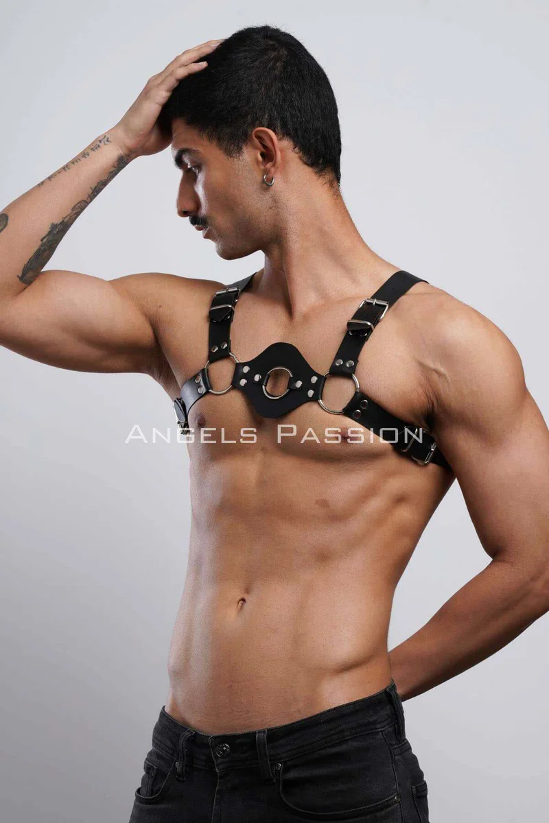Black O-ring chest harness showing strap configuration and D-ring accents