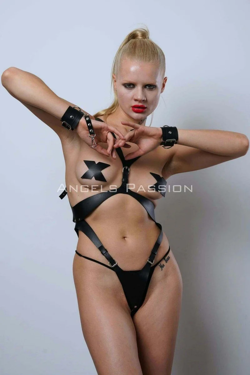 black vegan leather thong with harness strap connection