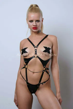 Black faux leather full body harness with O-rings and detachable chain