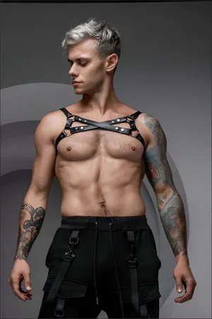 Black faux leather chest harness with O-rings and adjustable straps