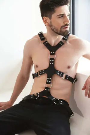 Black faux leather full body harness with adjustable straps and O-rings