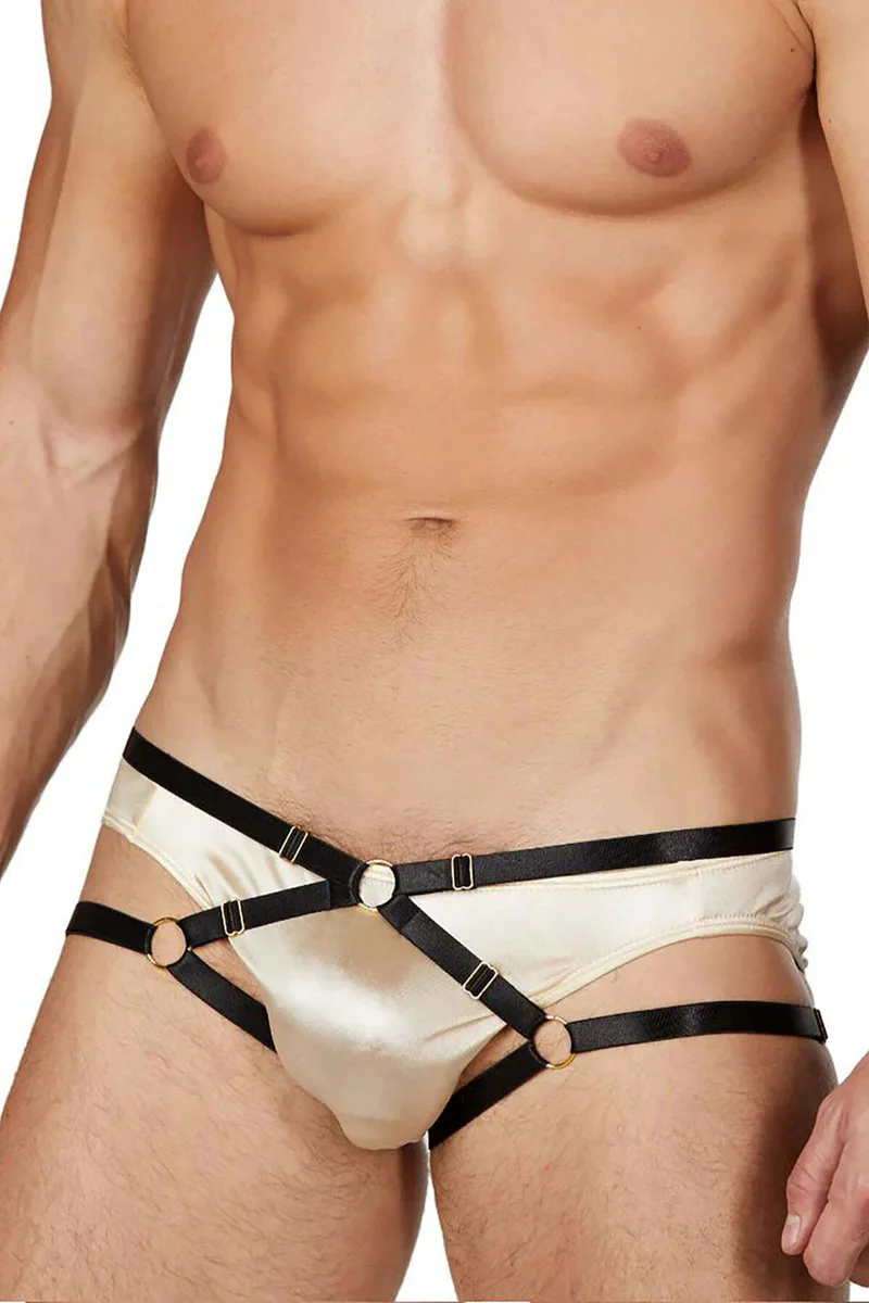 Cream harness brief with O-ring accents and black trim