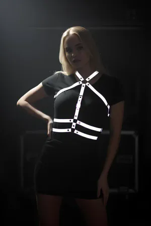 Reflective chest harness with adjustable straps on a model