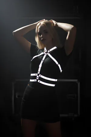 Reflective chest harness with adjustable straps on a model