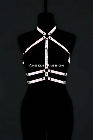 Reflective chest harness with adjustable straps on a model