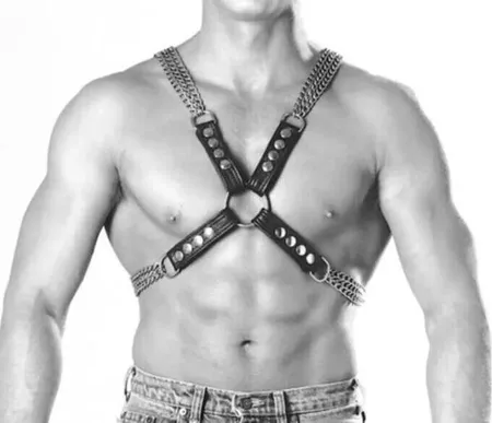 Black faux leather chest harness with silver chain details and central O-ring
